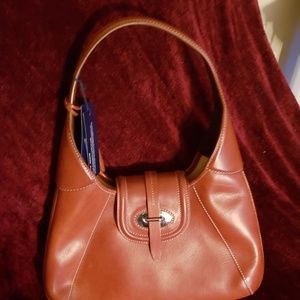 Authentic Dooney& Bourke shoulder bag. Ginger